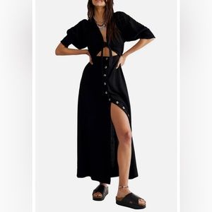 Free people black maxi dress. Never worn. Still new with tags on. Size XS.